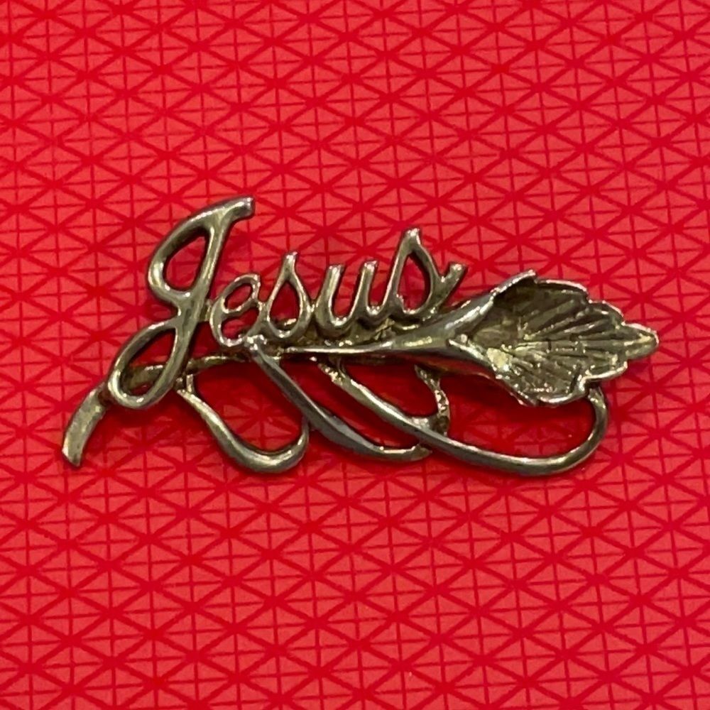 Vintage signed BSK Jesus flower silver-tone brooch